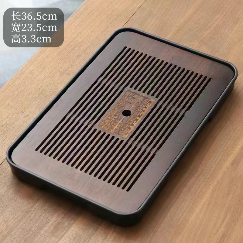 シンプルな竹製のお茶の皿の工夫の茶器は水を切って排水のお茶のトレーを蓄えます。|undefined