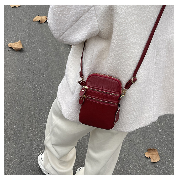 Women's Solid Color Genuine Leather Zipper Phone Wallets display picture 1