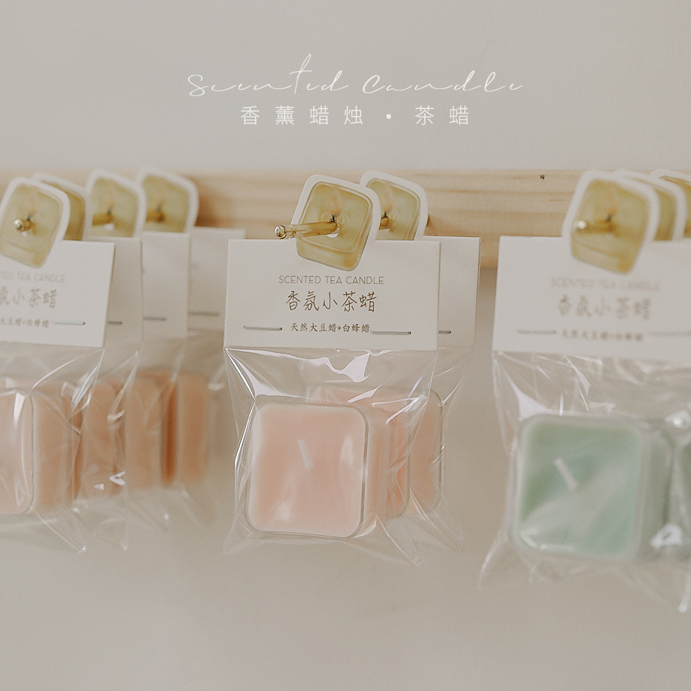 Velas cuadradas aromáticas sensación de atmósfera creativa regalo de mano cera de té de color al por mayor 4 horas de cera de estilo de perfume