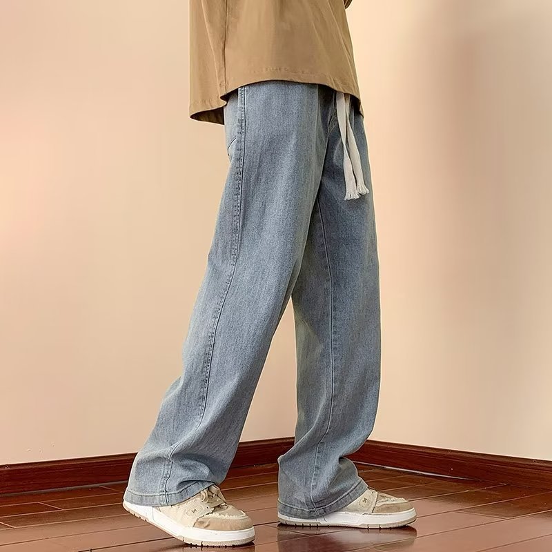 Pantalones ins temperamento masculino tendencia simple juventud popular primavera y otoño jeans nuevo estilo cintura media marea literatura perezosa