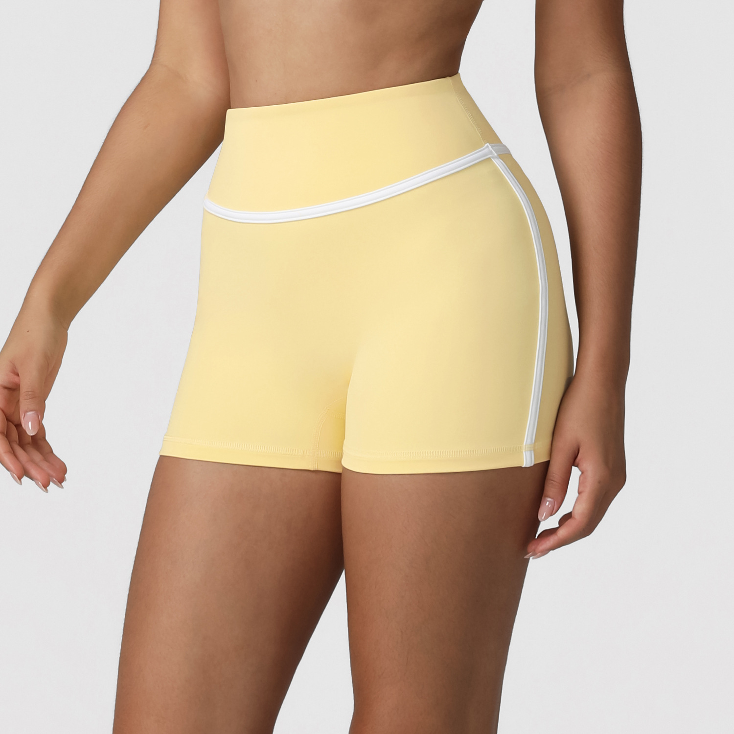 Pantalones cortos de yoga de cintura alta y abdomen de color de contraste europeo y americano