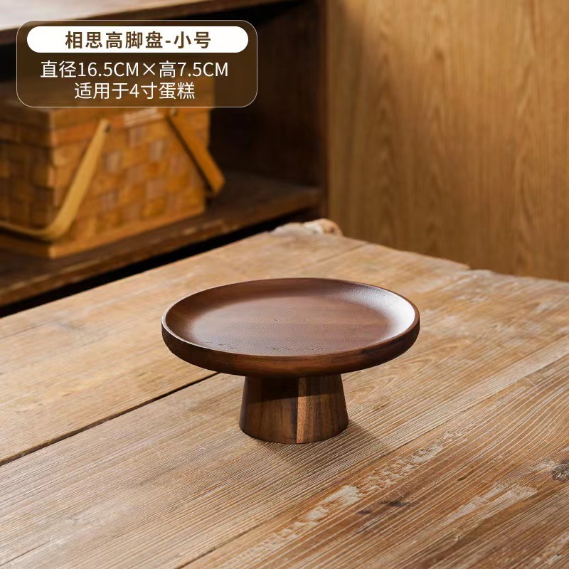 レトロなアカシアの木のケーキのトレーの家庭用の客間のお菓子の皿のデザートの台の展示棚の木製の高い足は果物の皿を試食します。|undefined