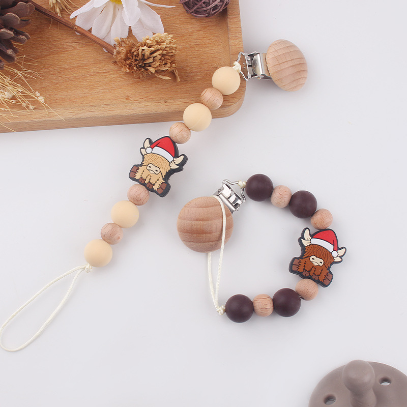 Productos para bebés y niños abrazadera de chupeta de beech creativa caricatura estereoscópica buey mordida cadena de chupeta de dientes molares anti-caída cadena