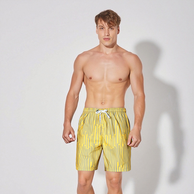 Verano nuevo estilo surf natación pantalones de cinco puntos diseño a rayas pantalones de playa de ocio deportivo para hombres sueltos de talla europea