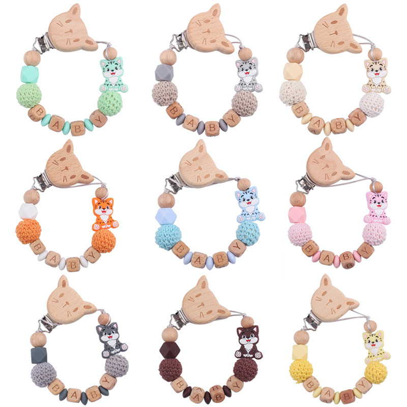 Nuevo bebé gato clip de chupeta de madera de haya dibujos animados juguetes de silicona para gatos calmar bebés chupeta cadena anti-caída cadena