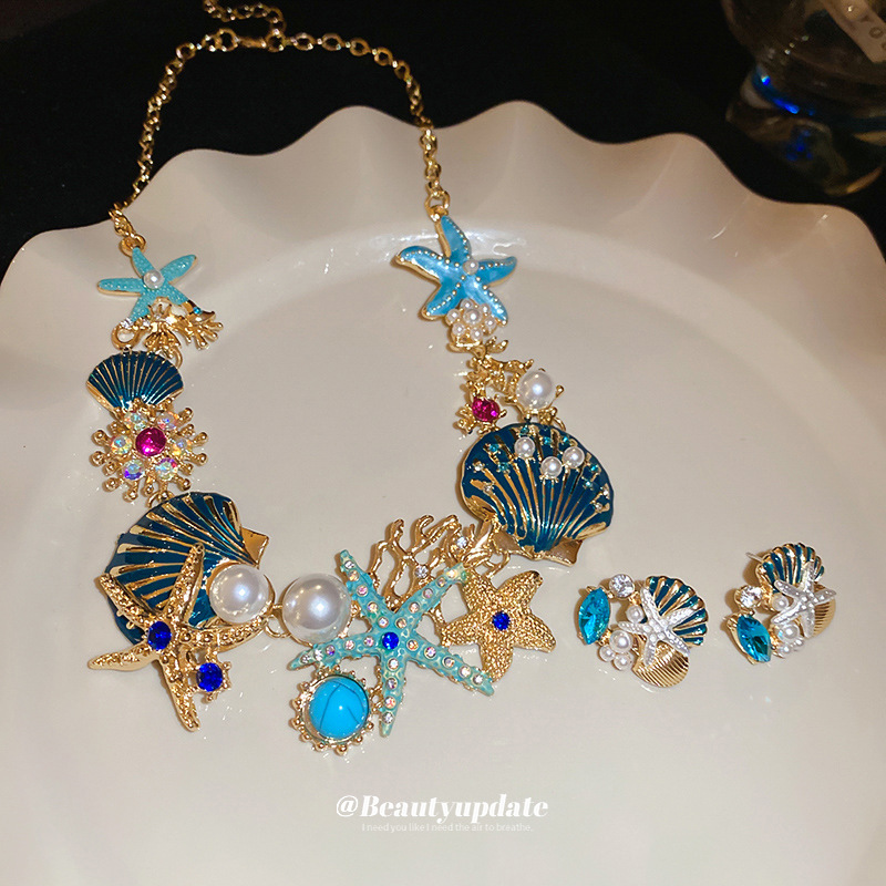 Collar de pendientes de coral de concha de estrella de mar goteando aceite, cadena de clavícula de todo fósforo de moda europea y americana, traje de nicho, lujo ligero, sentido de alta gama