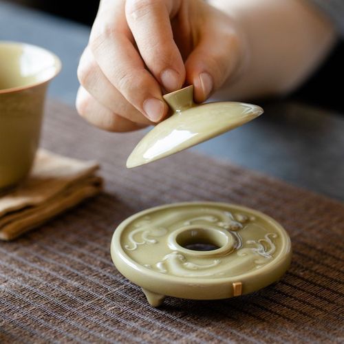 Ding kiln yellow hand-embossed dragon cover coaster ceramic kung fu tea set tea ceremony accessories literati cup holder