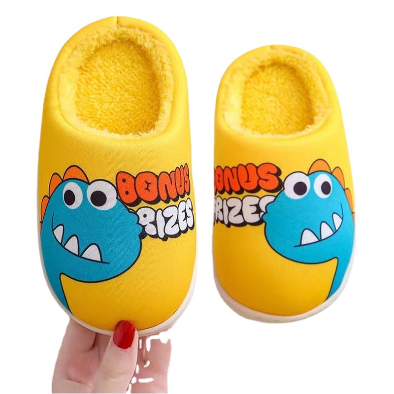Cixi Younuo zapatos 2023 otoño y el invierno de los nuevos niños zapatillas dibujos animados Pequeño Dinosaurio Casa algodón en stock al por mayor