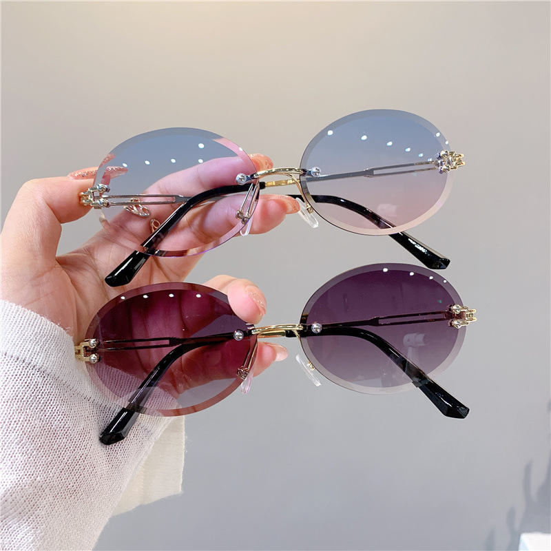 New Sunglasses Women's Oval Gradient Sunglasses Frameless Cutting Edge Trendy Glasses_voghion.com