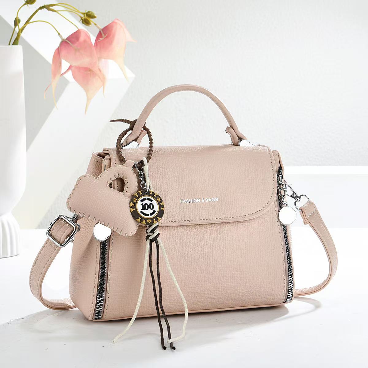 Bolsas de textura universal bolsas de mano colgantes bolsas de mano de transporte diario bolsas de hombro de moda casuales bolsas transfronterizas