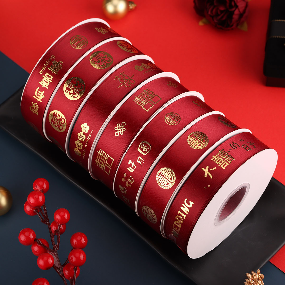 Wedding gift wrapping red satin ribbons with auspicious characters, bundling red silk for the wedding celebration, decorating the car and furniture with satin ribbons.
