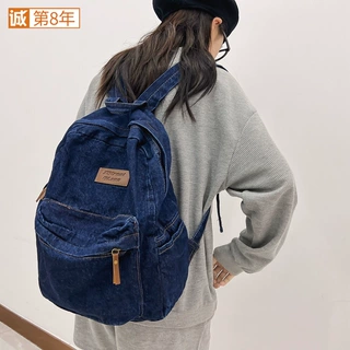 2022新款书包男生高中大容量初中生牛仔布中学生韩版休闲女双肩包