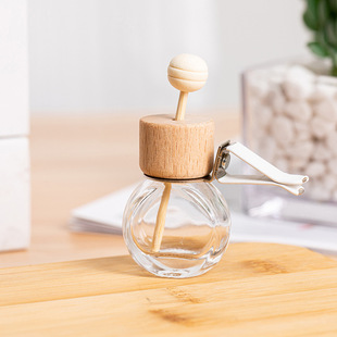 Small round cap can stick cartoon car air outlet perfume bottle car air conditioner perfume empty bottle car air outlet bottle