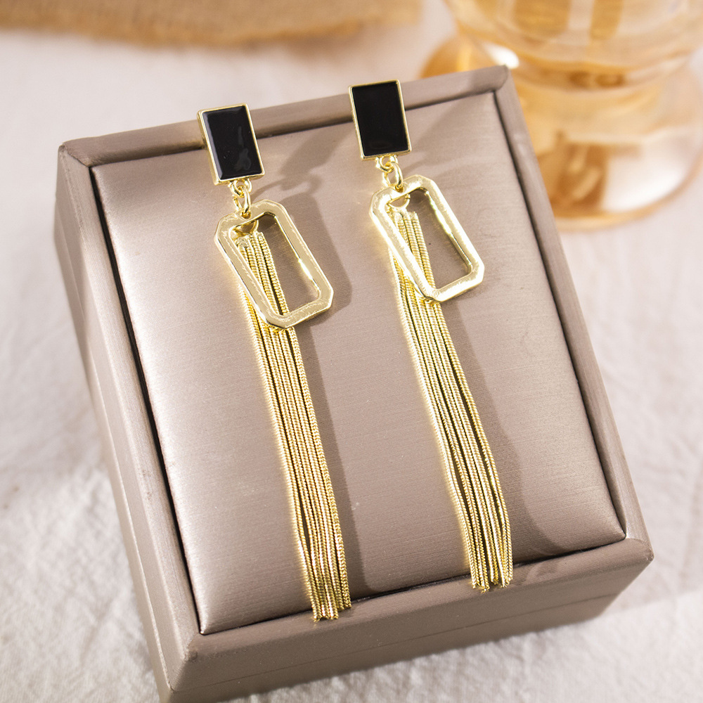 Pendientes largos con flecos elegantes y diamantes con aguja de plata Pendientes de todo fósforo de temperamento de nicho Pendientes simples y ligeros de lujo de alta gama Mujeres