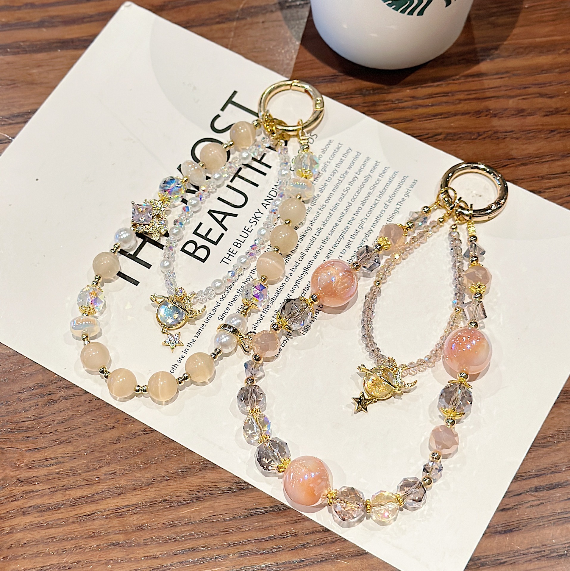 Boutique hecho a mano de alta gama para teléfono móvil cadena larga de vidrio de universo pequeño femenino cordón de teléfono móvil de moda colgante de mensajero largo