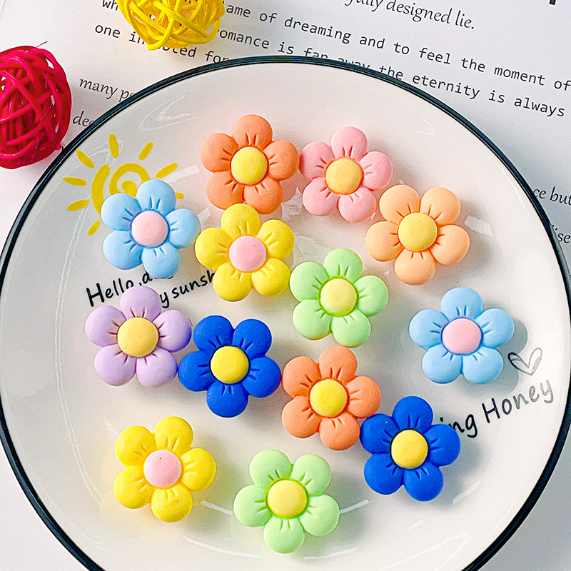 Nuevas series de flores de siete colores DIY accesorios de resina crema agujero de goma agujero de botón de zapato flores transparentes botón de zapato desmontable