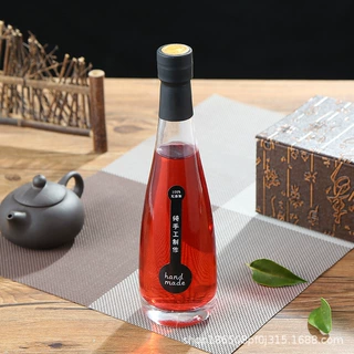 现货可定制logo批发透明蒙砂密封矿泉水瓶饮料瓶果酒玻璃瓶