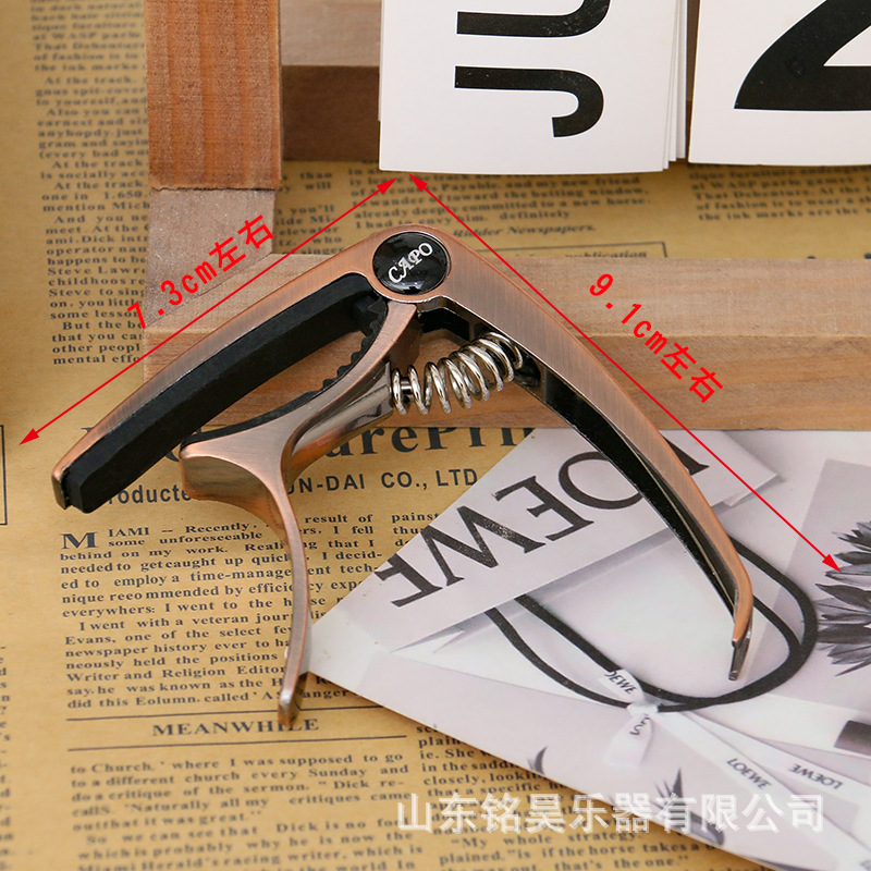 Guitarra Capo aleación de zinc Capo guitarra folk de doble propósito de afinación guitarra eléctrica fábrica al por mayor accesorios para instrumentos musicales