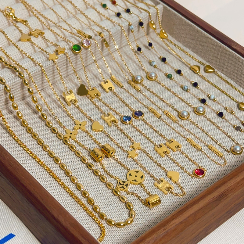 Cross-border fashion niche design titanium steel necklace commuter all-match high-end clavicle chain real gold plating color retention collection