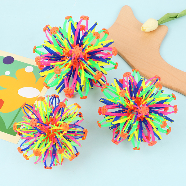 Children's magic telescopic ball player grabs and kicks the flower…