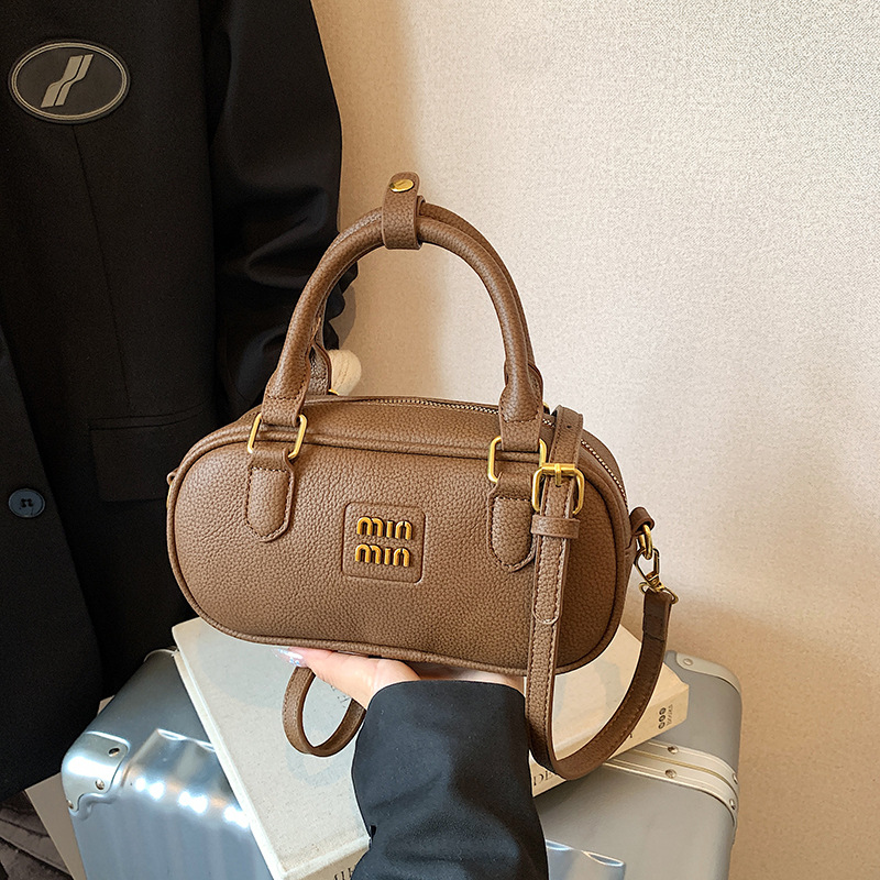 Bolsa de bolos retrógrada 2026 nueva moda ligera de lujo bolso cuadrado bolso de hombro universal