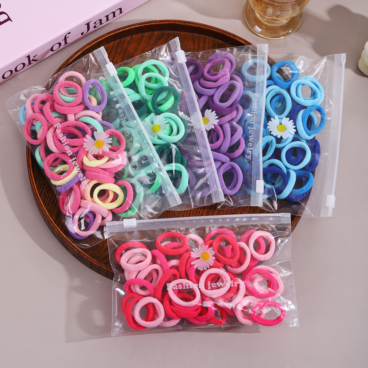 Anillo para el cabello de los niños de 3cm, anillo de toalla de color, bolsa de 50 margaritas, banda de goma, trenza pequeña duradera, sin costuras, alta elasticidad