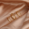 Golden ring, set, suitable for import, on index finger