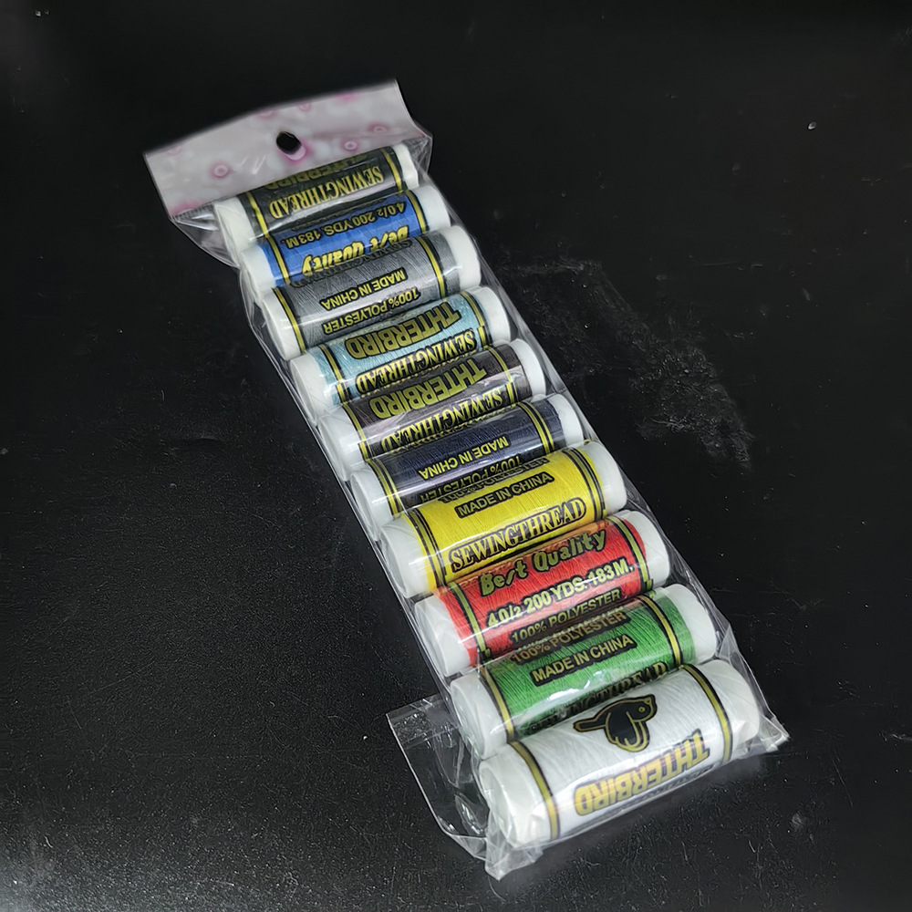 Fábrica de venta al por mayor de sutura de mano doméstica hilo de coser pequeño rollo de poliéster hilo de coser herramientas de reparación con tijeras