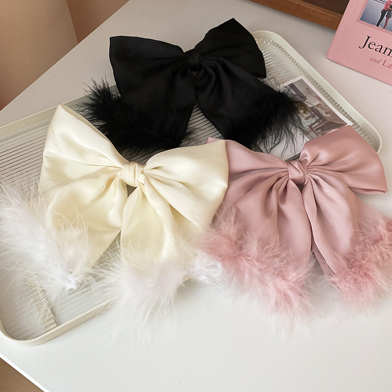 Women's Simple Style Bow Knot Alloy Cloth Feather Hair Clip display picture 12