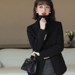 黒の痩せたウールのスーツのコート女性のファッション的な気質の一粒は職場のスーツの上着を身に着けている