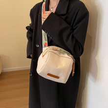 斜挎包女小众高级感百搭单肩贝壳包学生ins风帆布休闲通勤手机包