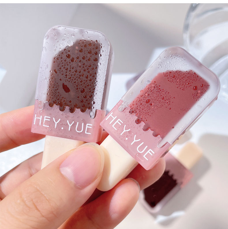 HEYYUE ice cream lip gloss small pudding makes the lips look fair. Red velvet matte lip paste is not easy to stick to cups. Lip gloss is affordable undefined