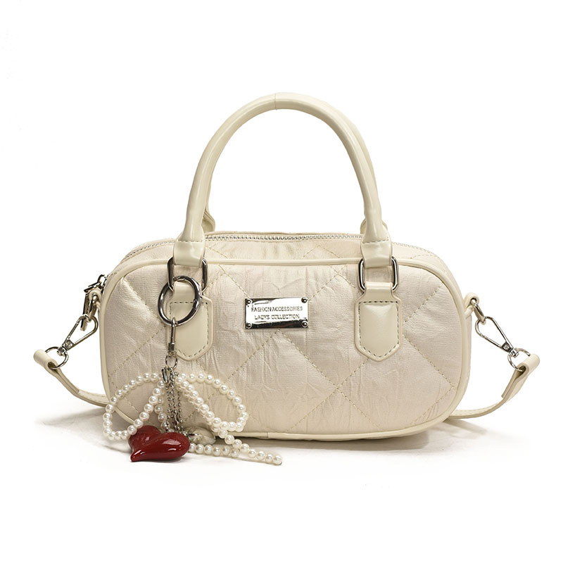 Bolsa de bolos de mano popular de este año para mujeres 2025, nueva bolsa de hombro de tendencia universal de alta calidad, bolso cuadrado de estilo extranjero