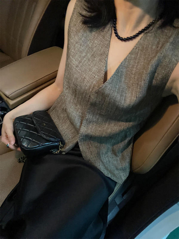 フランスの小さな香りの亜麻のvネックの袖なしのベストの女性の夏の新型は腰を収めて身を修めるデザイン感があります。|undefined