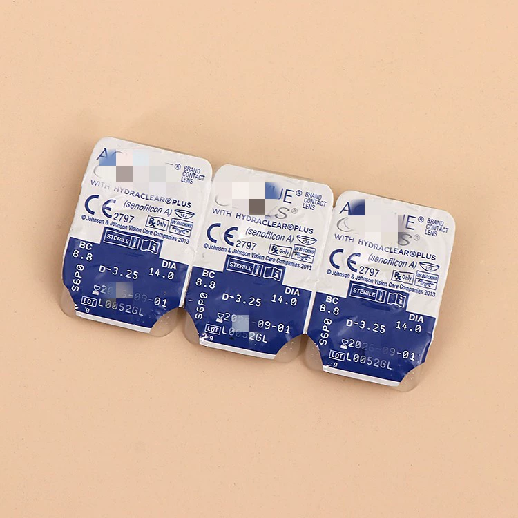 Контактные линзы Три-пять последовательных пленок алюминиевой фольги легко разорвать