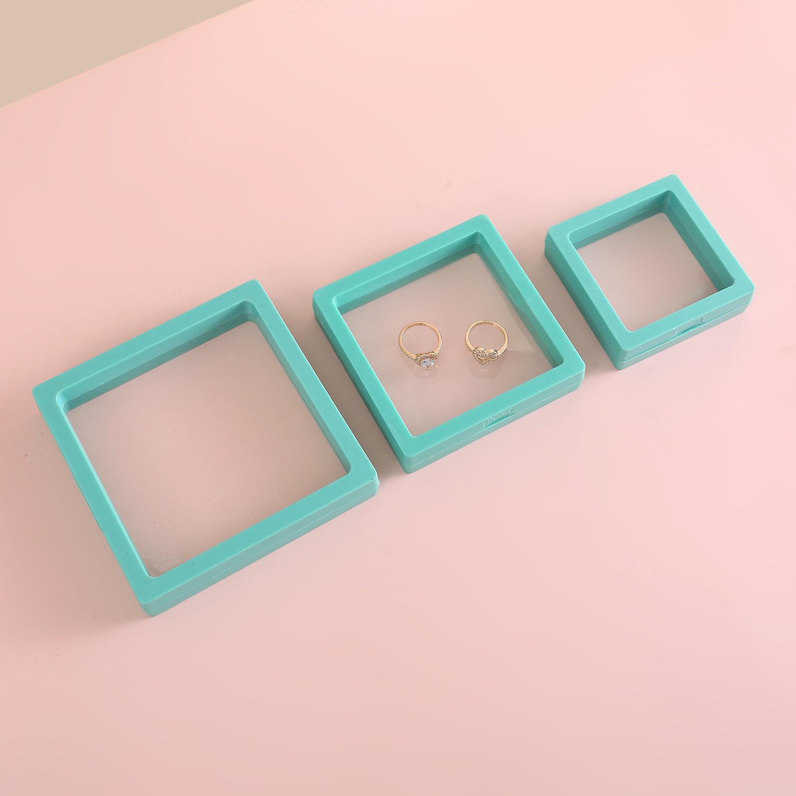 Caja de joyería PE caja de almacenamiento de brazaletes caja de exhibición de joyería caja de suspensión caja de película de papel elástica transparente para usar armadura