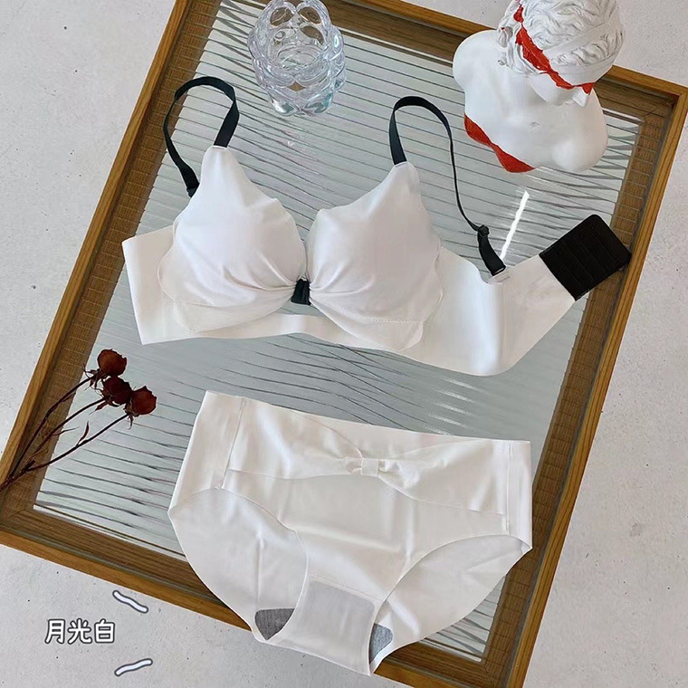 El otoño y el Invierno nuevo color puro de la muchacha las mujeres ropa interior cómoda inalámbrico pequeño pecho lado cierre profundo V empuja hacia arriba el sujetador traje 8282