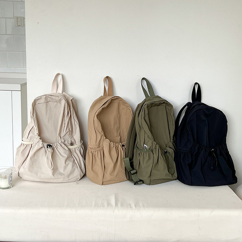 Korean style new college student backpack commuter women's large capacity casual drawstring pleated design nylon backpack for women