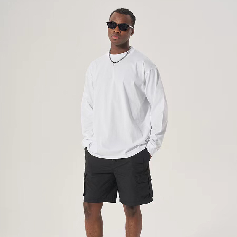 Marca de moda de cuello redondo camiseta de manga larga hombre de verano de color sólido relajado pareja casual hip-hop vientos versátiles tendencia superior