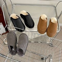 羊の毛皮の一体のカジュアルなファッションの家のスリッパの男女のカップルの外は包頭の平底の百合の毛の皮質を着て引っ張ります。
