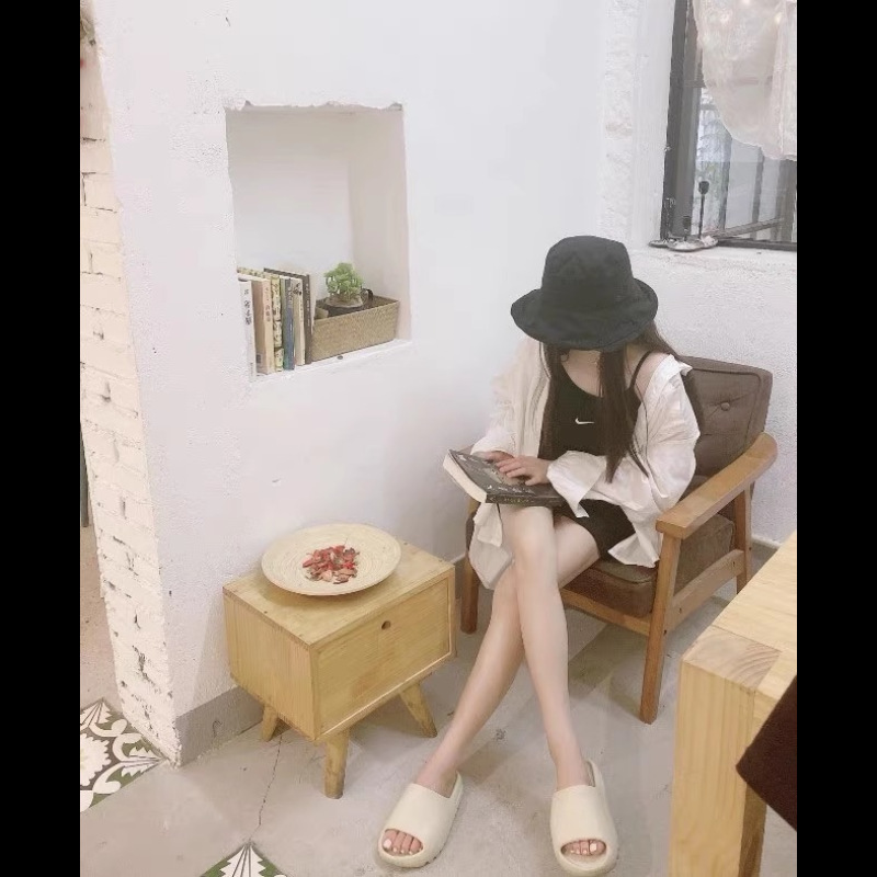 Zapatillas transfronterizas para hombres EVA sensación de mierda de verano de coco para parejas antideslizantes para el baño doméstico zapatillas frías para mujeres