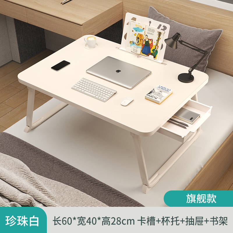 昇降可能な折りたたみ式ベッドの上の小さなテーブルは簡単です。|undefined