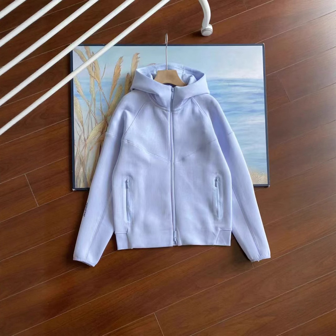 25 años primavera y otoño nuevo estilo casual deportes capa de aire chaqueta con capucha y pantalones trajes 454 y 461