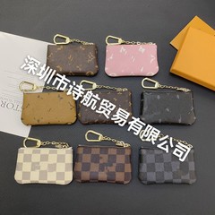 財布欧米の対外貿易の経典の小銭入れのイヤホンの包みは色を合わせます。