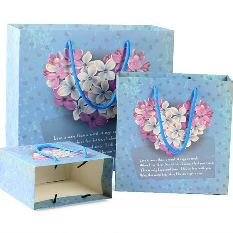 Bolsa de regalo floral bolsa de embalaje de ropa bolsa de papel de regalo de mano bolsa de regalo al por mayor bolso de regalo de ramo