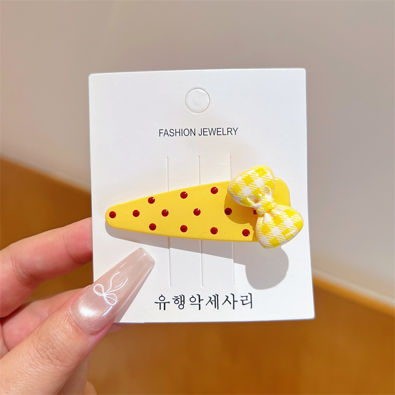 노란색 물방울무늬 리본