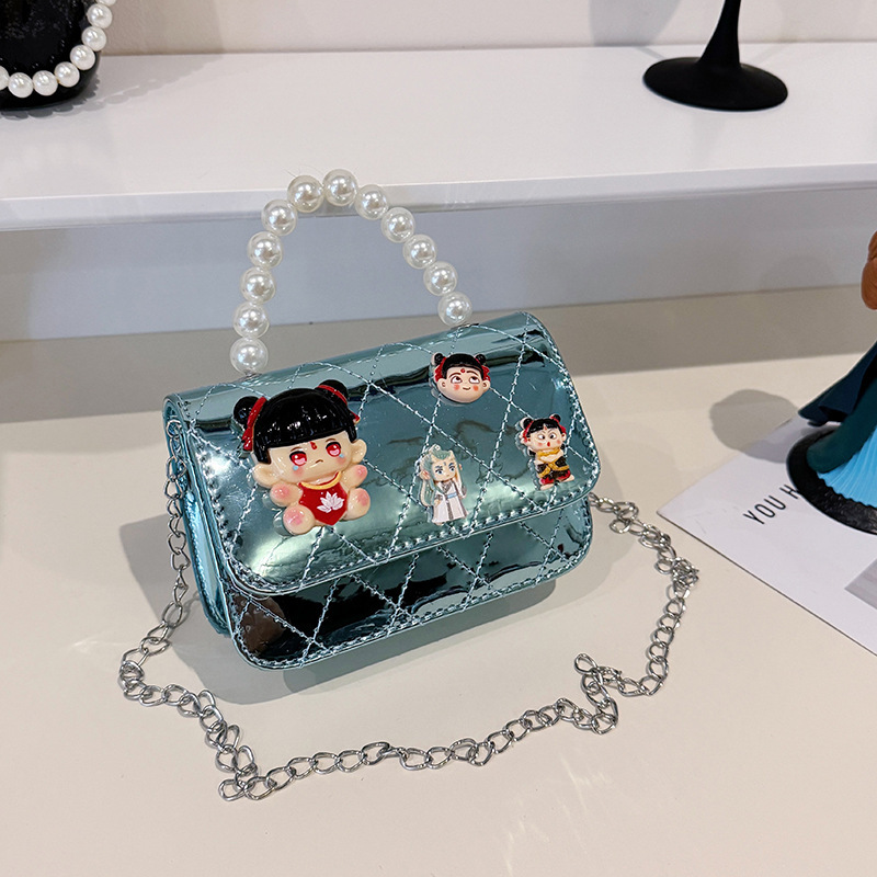 2025 nuevo niño pequeño viento mochila de hombro pequeña niña espejo princesa bolso de perla bolso de dibujos animados
