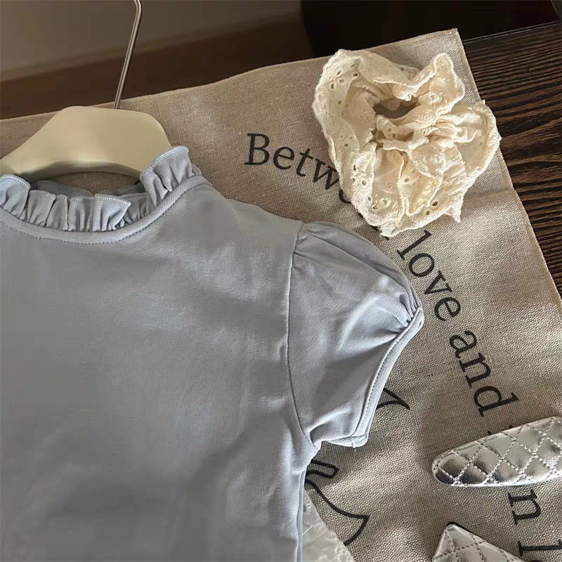 Estrella infantil coreana nueva primavera y verano ropa de niñas niños encaje hueco falda de busto falda de aire al por mayor de la moda