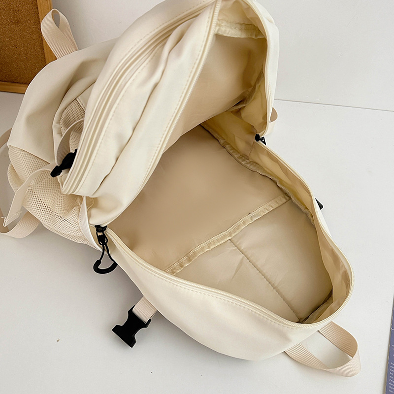 2024 mochila escolar para estudiantes universitarios nueva mochila simple de gran capacidad ocio al aire libre mochila ligera de secundaria al por mayor