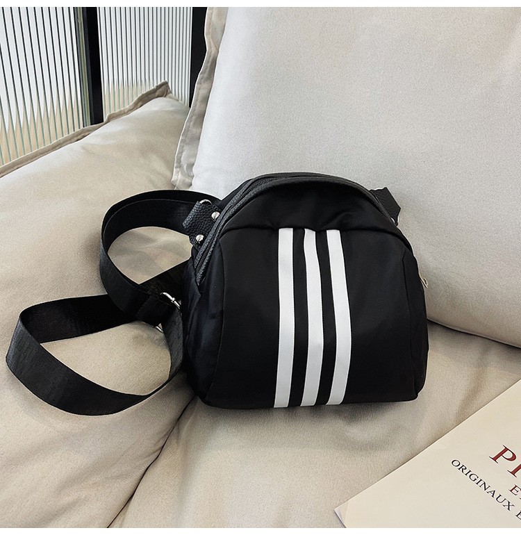 The 2024 new stylish and simple crossbody bag, a large-capacity versatile single-shoulder bag, is popular among students. The three-bar chest bag is selling well undefined